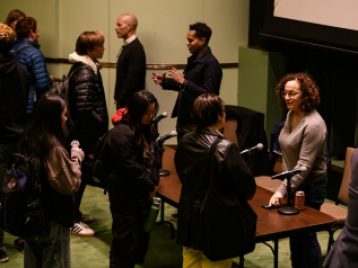 Panel Engaging with Audience  